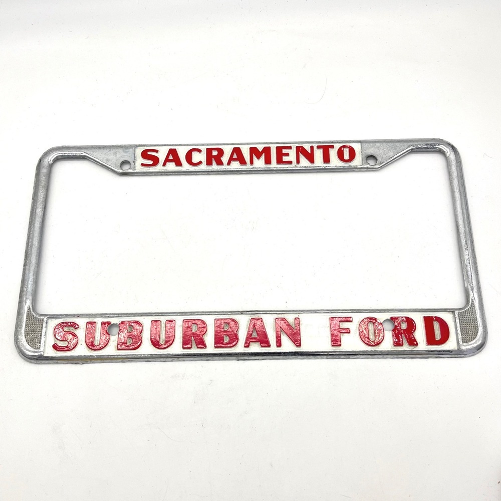 Vintage Suburban Ford Sacramento License Plate Frame Chrome Red White Metal